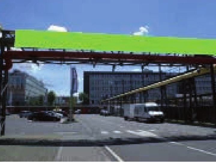 Beispielfoto: Banner neben dem Kassenbereich, die grüne Fläche zeigt die Position